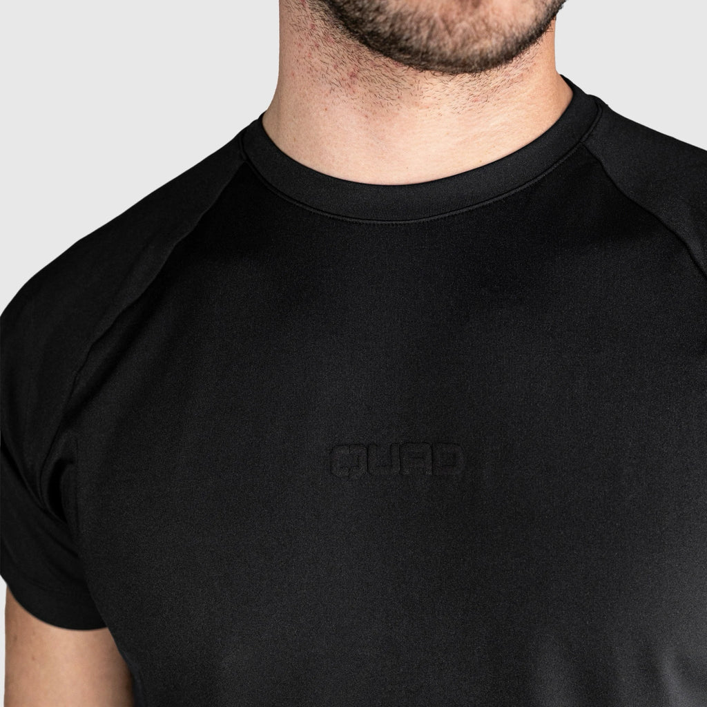 QUAD Ace Padel T shirt with a brand logo on a plain background