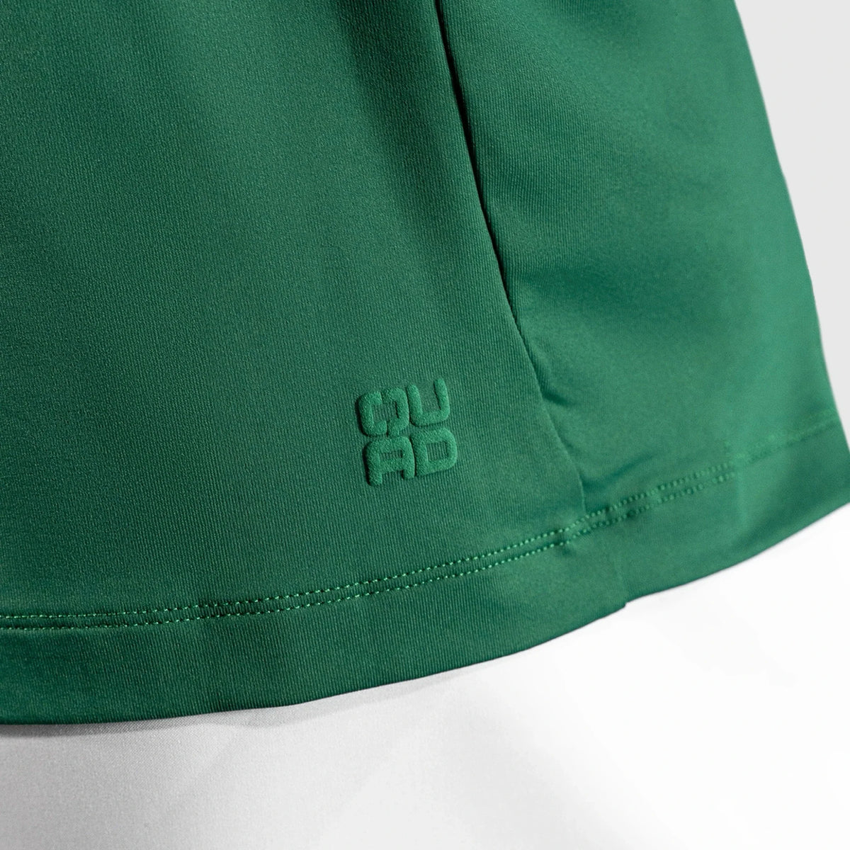 QUAD Ace Padel green T-shirt  a logo detail