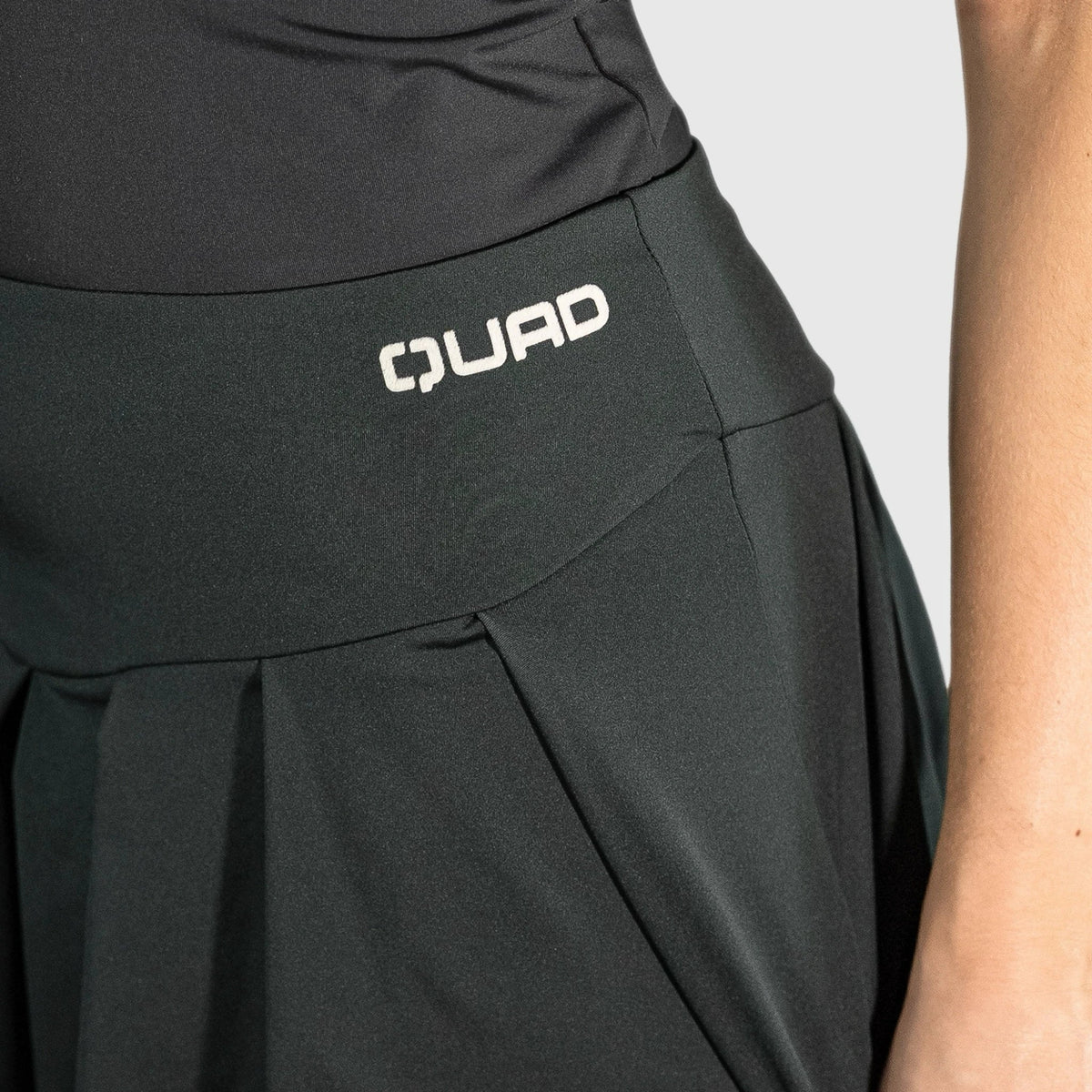 Squid Padel Skirt Grey with 'QUAD' logo on a plain background